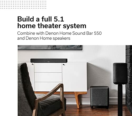 Denon home theater system setup with sound bar and speakers.